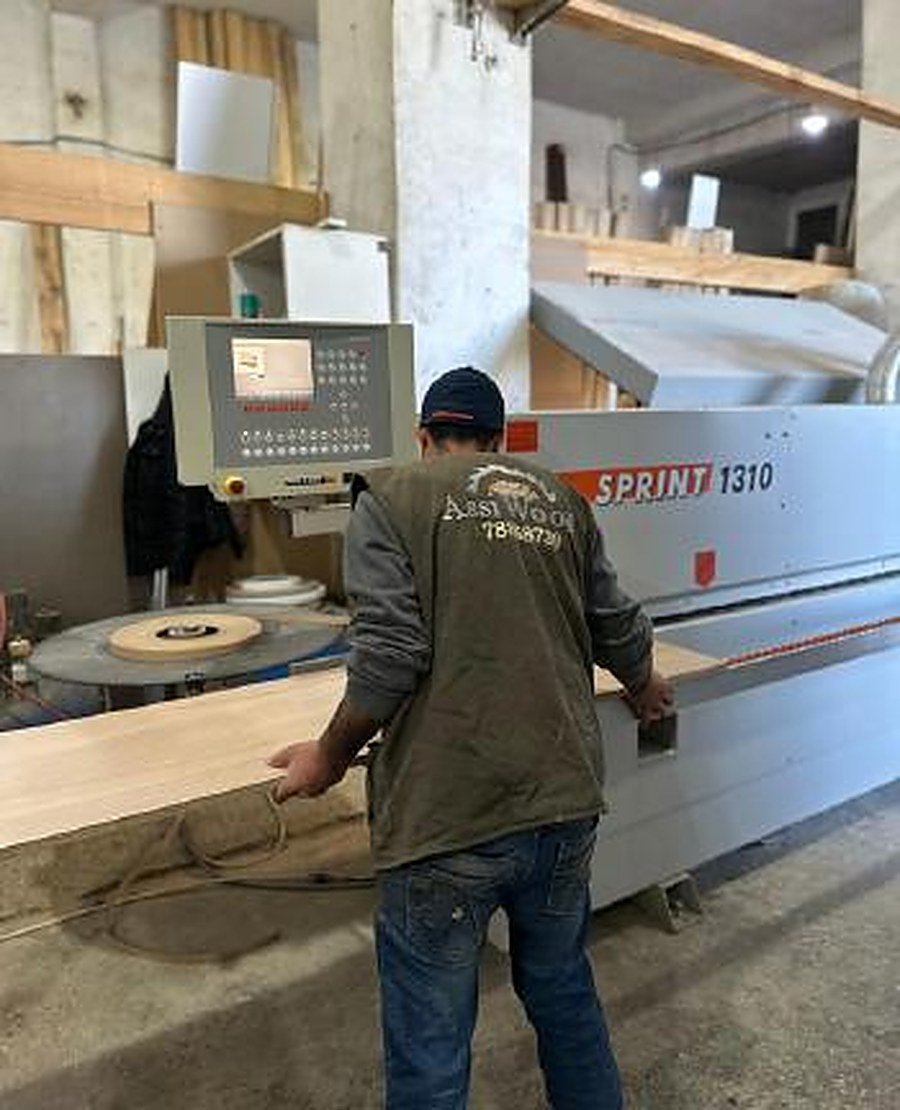 Edge banding machine at work