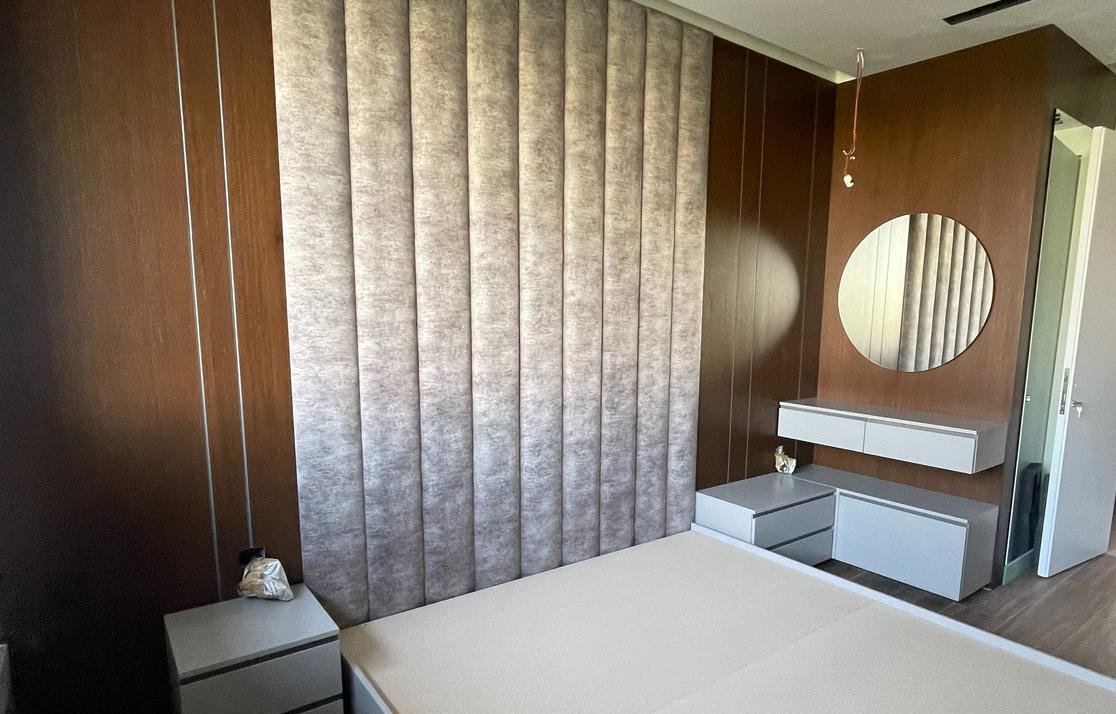 Walnut headboard wall with dressing table