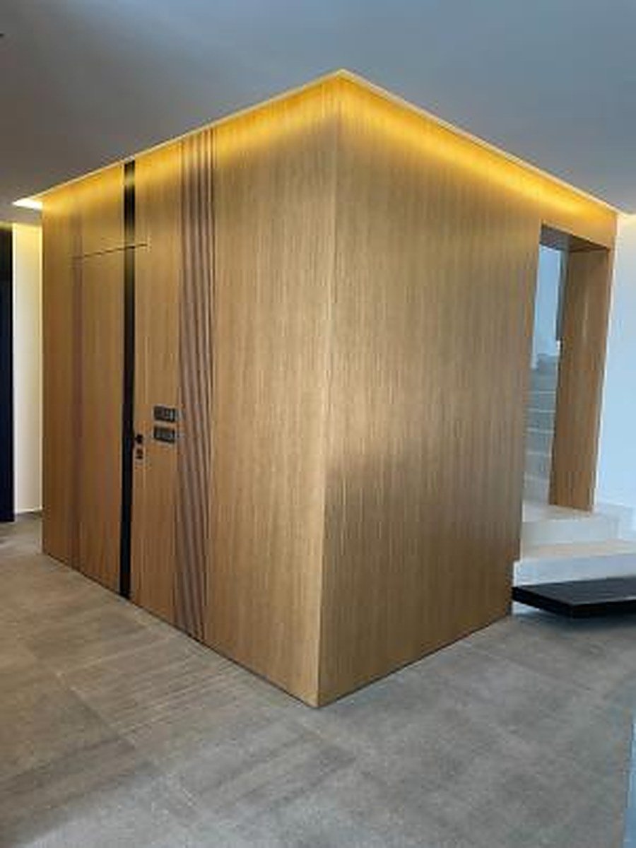 Wide opening glass and wood entrance door