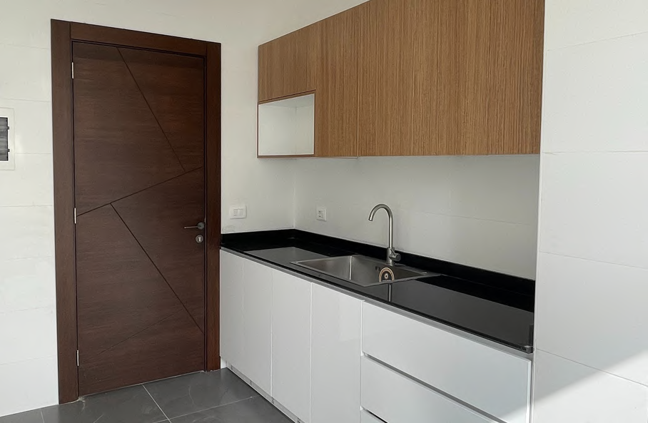 White kitchen with wood upper cabinets