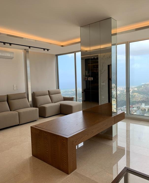 Custom dark slat wall panel and dressing table
